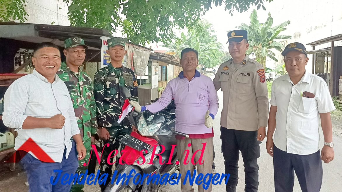 Sinergi TNI-POLRI Kibarkan Merah Putih Perkuat Nasionalisme di Tanjung Beringin Serdang Bedagai